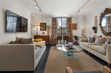 Living room with wood finished floors, plenty of n