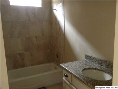 Granite and tile in the two main baths