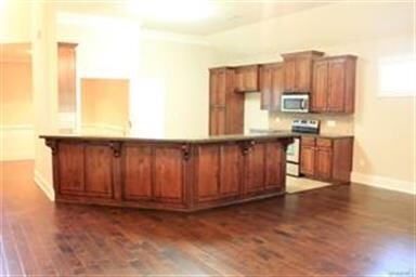 Kitchen with Huge Wrap-Around Breakfast Bar