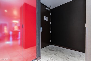 Hallway with marble finish floor