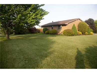 Exterior Back. Beautiful landscaping