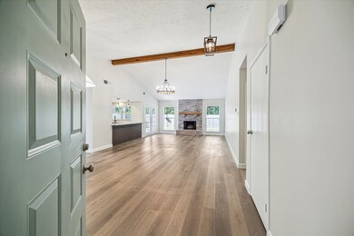 Vinyl plank flooring runs throughout the house