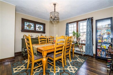 Dining Room - Original stained glass windows. Non-