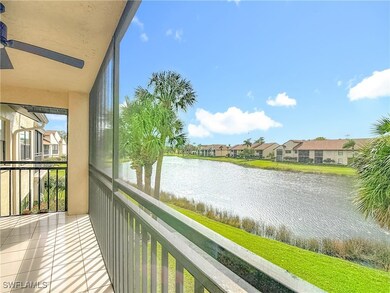 Balcony featuring a water view, a sunroom, a ceiling fan, and a residential view