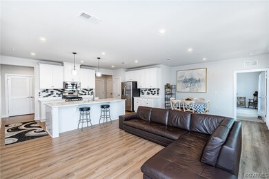Open living, dining, kitchen area