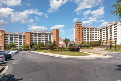 View of building exterior featuring uncovered park