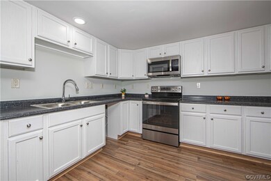 Kitchen featuring appliances with stainless steel