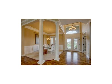 Grand entry with gleaming hardwoods throughout!