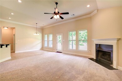 Crown Molding and wall of windows overlooking back