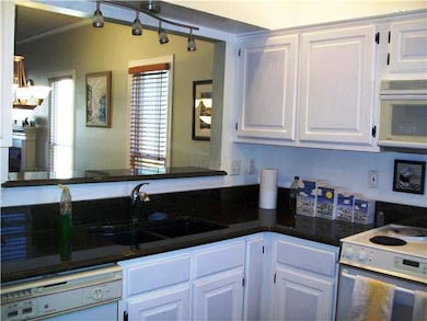 Pretty Kitchen with updated lighting and beautiful