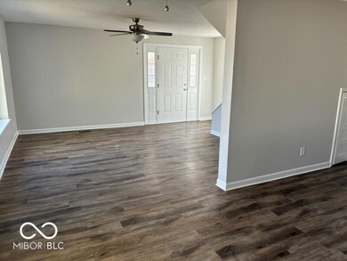 View into the living room with lots of natural light