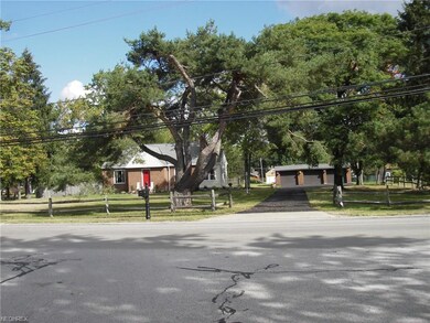 VIEW OF FRONT OF HOUSE WITH SPLIT RAIL FENCE