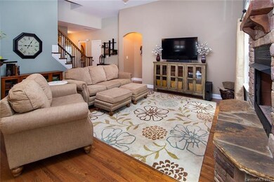 Spacious living room with neutral paint.