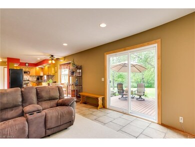 Family room opens thru sliding patio doors to a la