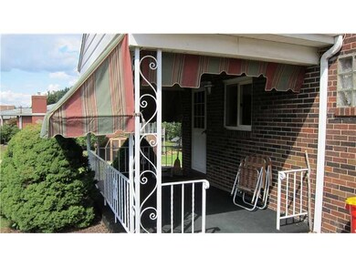 Other. Side covered porch with entrance to kitchen