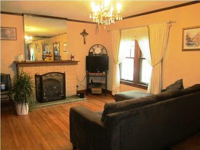 Spacious living room with wonderful wood floors an