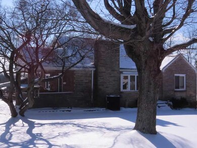 Exterior Front. This view shows side entry into ho