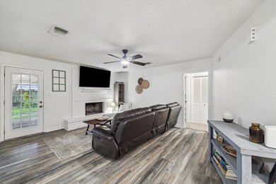 The glass door in the family room fills the space