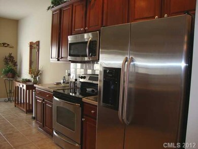 Kitchen - Open kitchen with stainless steel applia
