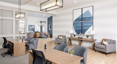 Home office with recessed lighting and wood finished floors