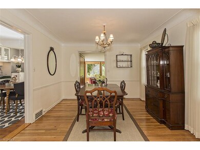 Formal dining room w/ gorgeous hardwood floors. Ac
