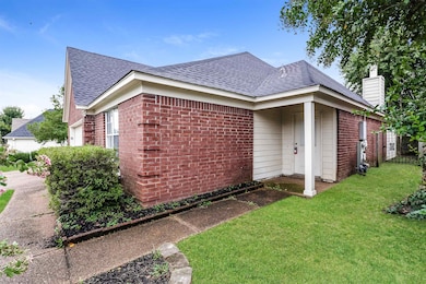 View of home's exterior with a lawn