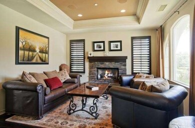 Enter into a warm and welcoming front living room 