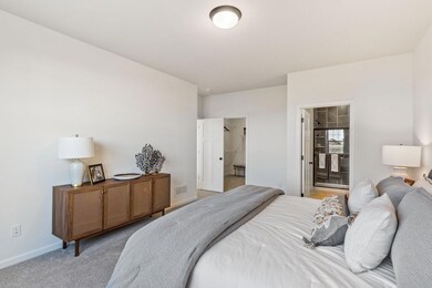 Main Floor Owner's Suite with a huge walk in closet