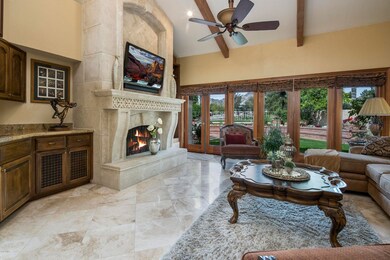 Grand Great Room and Stone Fireplace