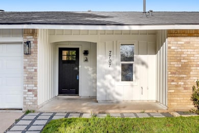 Entrance to property featuring board and batten s