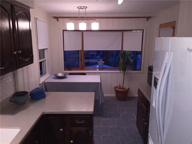 Kitchen: features ceramic tile flooring, cherry wo