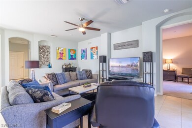 Large living area with tile floors throughout the