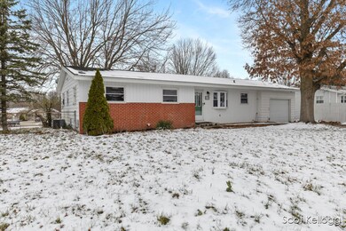 323 E Beech St NE, Cedar Springs, MI 49319 - photo 2