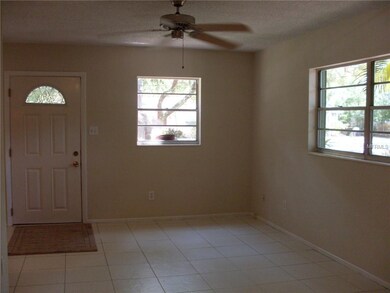 Living room with tile flooring.