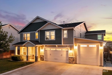 Craftsman inspired home with board and batten siding, covered porch, concrete driveway, a garage, and stone siding