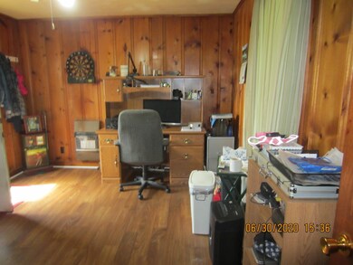 NICE SIZE ROOM THAT IS BEING USED AS AN OFFICE, BUT COULD EASILY BE USED AS A 4TH BEDROOM