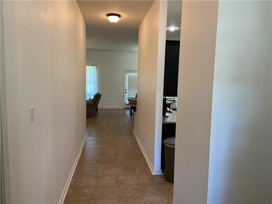Foyer leading into open floor plan