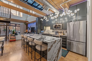 Kitchen featuring light wood finished floors, a ki