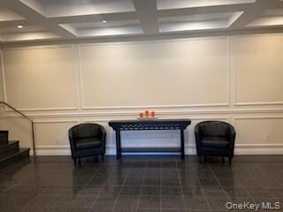 Lobby under  Renovation. Featuring  Beamed Ceiling, Granite Floors and Modern Vibe