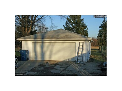 Oversized 2 car garage has a 220 line.