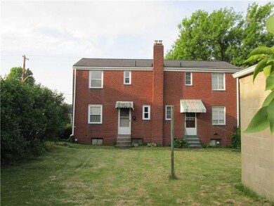 Exterior Back. Nice back yard with bushes to provi