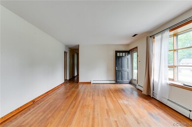 Spare room with light hardwood / wood-style floors