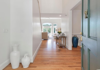 Hallway featuring light wood-type flooring
