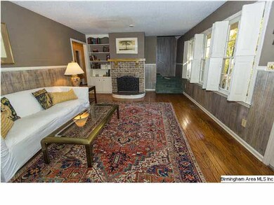Family den with lots of windows, hardwoods and fir
