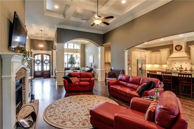 You'll love the entertaining flow provided by the den being open to the kitchen and the diningroom both.   In addition, come in and out of the action onto the screened in porch when the weather beckons you!