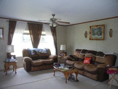 Roomy 18x15 Living Room with open concept floorplan.