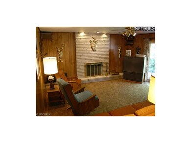 Newer door to patio on the right.  1/2 bath in thi