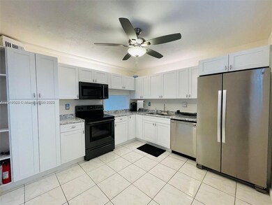 4940 E Sabal Palm Blvd unit 302, Tamarac, FL 33319 - photo 2