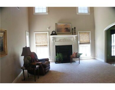 Living Room. Spacious living room with fireplace.