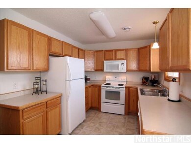 The kitchen has more than ample counter and cabine
